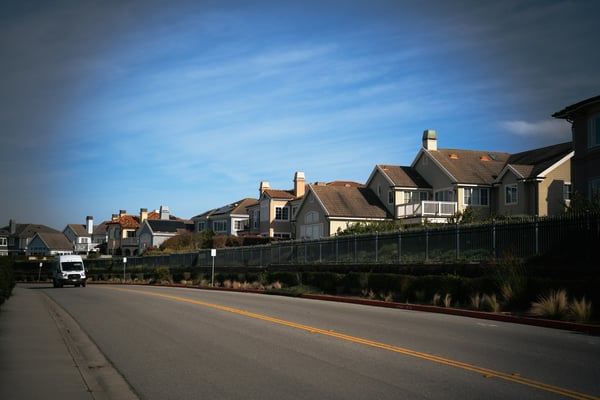 Residential street with homes for sale